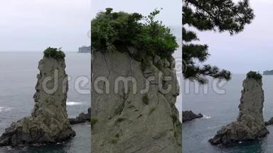3乘1。 移动设备上社交媒体应用的垂直视频。 韩国济州岛的Oedolgae Rock